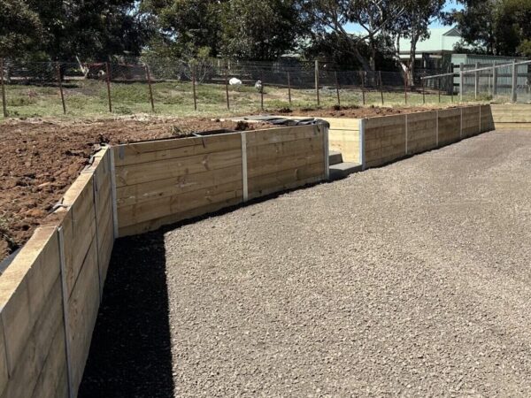 Timber sleeper retaining wall with steel posts in Western Victoria