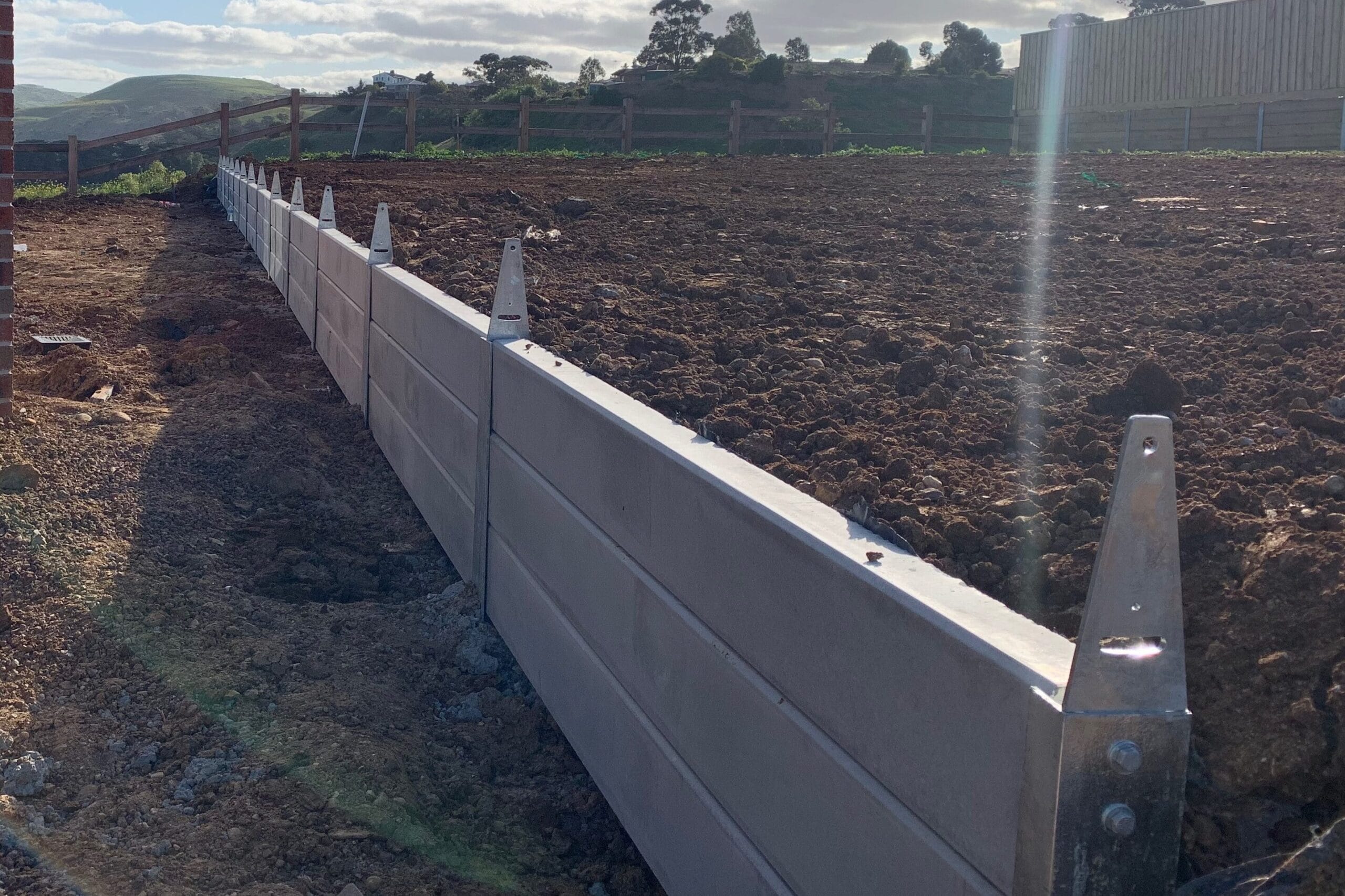Boundary_fence-on-retaining-wall - Outwest Retaining Walls Boundary_fence-on-retaining-wall